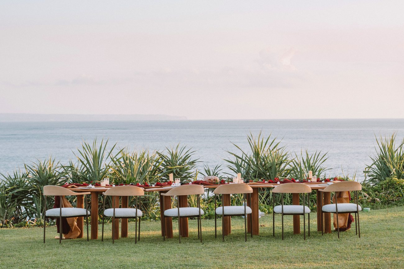 Long dining table on the clifftop lawn